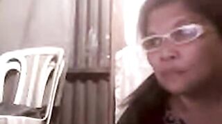 57-Year-Old Asian Granny Flashes on Webcam