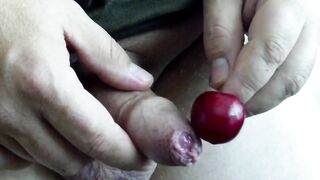 Uncut cock cumming twice on a cherry