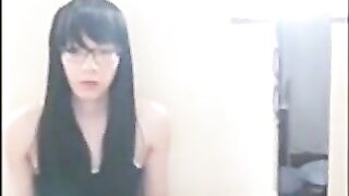 Cute Asian crossdresser cums on rubber cock 3